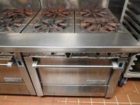 GARLAND 4-BURNER RANGLE / OVEN W/ STAINLESS STEEL SHELVING - (LOCATION: 2ND FLOOR KITCHEN)