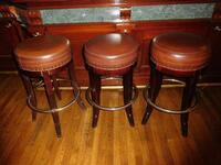 (3) BROWN ROUND LEATHER BAR STOOLS (SIZE: 31" TALL X 16" DIAMETER)- (LOCATION: 2ND FLOOR MAIN BAR)