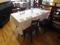 (3) (SIZE: 2.5 FT X 2.5 FT) BANQUET TABLES W/ (6) WOODEN CHAIRS - (LOCATION: 2ND FLOOR MAIN DINING AREA)