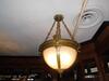 LARGE HANGING HALF-DOME LAMP W/ BRASS CHAIN & MOUNT - (LOCATION: MAIN 1ST FLOOR BAR NEAR ENTRANCE)