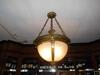 LARGE HANGING HALF-DOME LAMP W/ BRASS CHAIN & MOUNT - (LOCATION: MAIN 1ST FLOOR BAR NEAR ENTRANCE)