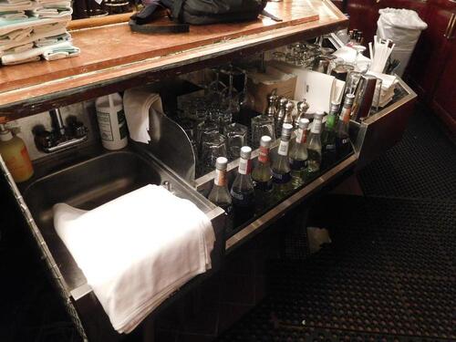 (2) SMALL STAINLESS STEEL SINKS + STAINLESS STEEL ICE BIN + DRAINBOARD - (LOCATION: MAIN 1ST FLOOR BAR NEAR ENTRANCE)