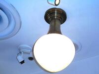 (2) HANGING WHITE LIGHTS W/ BRASS MOUNT - (LOCATION: 1ST FLOOR DINING ROOM NEAR CIGAR SMOKE ROOM)