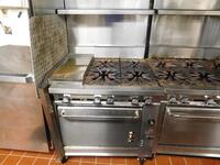 MONTAGUE 4-BURNER RANGE / GRIDDLE / OVEN W/ 2 ATTACHED SHELVES - (CONTENTS OF SHELF NOT INCLUDED)- (LOCATION: 1ST FLOOR KITCHEN)