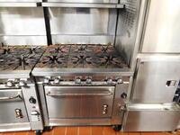 MONTAGUE 6-BURNER RANGE / OVEN W/ 2 ATTACHED SHELVES - (CONTENTS OF SHELF NOT INCLUDED)- (LOCATION: 1ST FLOOR KITCHEN)