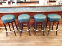 (4) LB FURNITURE BROWN ROUND LEATHER STOOLS (31" TALL X 16" DIAMETER) - (LOCATION: 1ST FLOOR STRIP SIDE BAR)