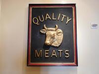 "QUALITY MEATS" BULL HEAD FRAMED WALL PROP - (LOCATION: 1ST FLOOR MAIN DINING AREA )