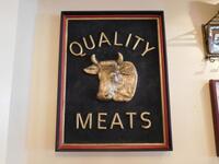 "QUALITY MEATS" BULL HEAD FRAMED WALL PROP - (LOCATION: 1ST FLOOR STRIP SIDE BAR)