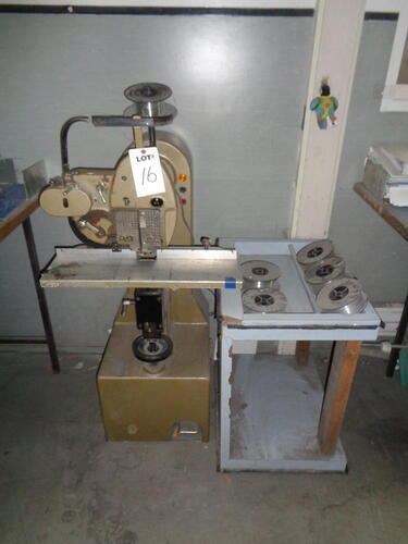 Wire stitcher, single head, continuous type, single phase electric motor and switch, assorted rolls of wire and side table, S/N 79155