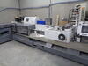 (2006) Heidelberg ST-350 Stitchmaster w/ 5 Vertical feeders (TAS350), 1 Horizontal Feeder (TAL350) 2-Head continuous stitcher, 3-Knife trimmer w/ take-off conveyer (TR350), Cover feeder (UFA350), Associated 3-phase electric motor and switch and equipment, - 3