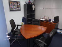 Directors desk with matching meeting table, shelf unit and 4 assorted chairs