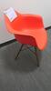 HERMAN MILLER "EAMES" MOLDED PLASTIC ARMCHAIR, WALNUT FINISH WOOD DOWEL BASE, RED ORANGE SEAT AND BACK. MSRP $666 - 2