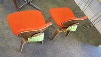 LOT OF 4, HERMAN MILLER "EAMES" MOLDED PLYWOOD LOUNGE CHAIR WITH WOOD BASE, WALNUT VANEER FINISH, ORANGE FABRIC UPHOLSTERED SEAT AND BACK. MSRP $2300 EACH.