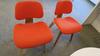 LOT OF 4, HERMAN MILLER "EAMES" MOLDED PLYWOOD LOUNGE CHAIR WITH WOOD BASE, WALNUT VANEER FINISH, ORANGE FABRIC UPHOLSTERED SEAT AND BACK. MSRP $2300 EACH. - 2