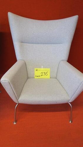 CARL HANSEN AND SON CH445 "WING CHAIR", LIGHT GREY FABRIC HIGHBACK CHAIR. WEGNER BUILT THE FULLY UPHOLSTERED EASY CHAIR UPON A SOLID BEECH FRAME THAT RESTS ON HAND-FINISHED STAINLESS STEEL LEGS. MSRP $5405