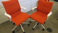 LOT OF 2, HERMAN MILLER "SETU" CHAIR, 5 STAR BASE WITH CASTERS, RIBBON ARMS, STUDIO WHITE FRAME, SEMI POLISHED BASE, CARPET CASTERS, ORANGE DIVINA FABRIC SEAT AND BACK. MSRP $1000 EACH.