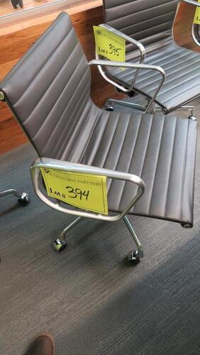 HERMAN MILLER "EAMES" ALUMINUM GROUP MANAGEMENT GROUP CHAIR, MANUAL LIFT WITH CASTERS AND ARMS, CARPET CASTERS WITH CHROME HOOD, POLISHED ALUMINUM BASE AND FRAME, BLACK MLC LEATHER. MSRP $2000