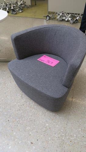 STEELCASE "JOEL" LOUNGE CHAIR BY COALESSE, DARK GERY FABRIC, TWO PIECE CONSTRUCTION, DOUBLE NEEDLE STITCH DETAIL, POLISHED TRIVALENT CHROME PLATED STEEL BASE, SWIVEL WITH AUTO-RETURN MECHANISM. MSRP $2039