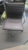 HERMAN MILLER "EAMES" ALUMINUM GROUP MANAGEMENT GROUP CHAIR, MANUAL LIFT WITH CASTERS AND ARMS, CARPET CASTERS WITH CHROME HOOD, POLISHED ALUMINUM BASE AND FRAME, BLACK MLC LEATHER. MSRP $2000