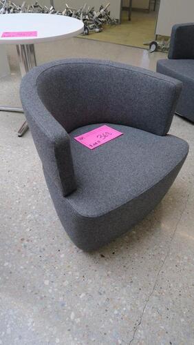 STEELCASE "JOEL" LOUNGE CHAIR BY COALESSE, DARK GERY FABRIC, TWO PIECE CONSTRUCTION, DOUBLE NEEDLE STITCH DETAIL, POLISHED TRIVALENT CHROME PLATED STEEL BASE, SWIVEL WITH AUTO-RETURN MECHANISM. MSRP $2039