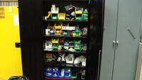 Black Storage cabinet with contents (screws, electrical parts)