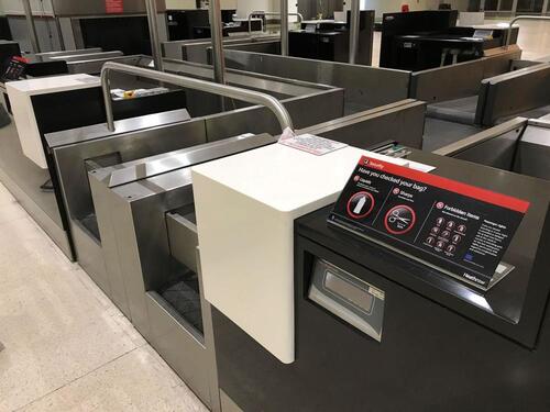 A pair of check in desks with Avery Weigh-Tronix scales 2KG-150KG. D 900mm, W 1250mm, H 1160mm. Weigh belt 900mm by 750mm. Feeder belt 1330mm by 750mm. Each desk complete with display screen and bracket. Desks consist of three drawers, digital display and