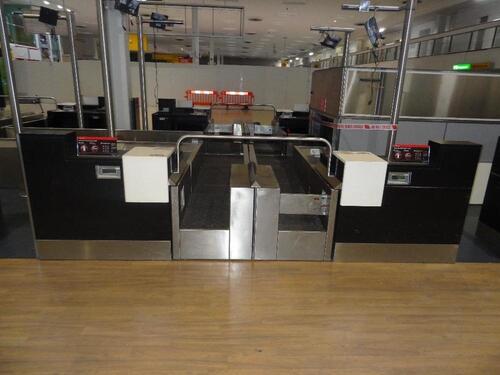 A pair of check in desks with Avery Weigh-Tronix scales 2KG-150KG. D 900mm, W 1250mm, H 1160mm. Weigh belt 900mm by 750mm. Feeder belt 1330mm by 750mm. Each desk complete with display screen and bracket. Desks consist of three drawers, digital display and