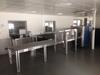 Smiths Heimann hand baggage scanner, complete with Smiths monitor desk/control and stainless steel roller bed system. - 2