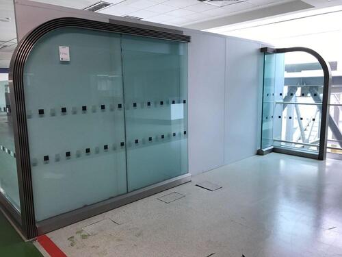 Three panel glass partion in two sections Main section H2270mm W2470 and small section H2270 W580 D1100mm including base. Double thickness 25mm glass.