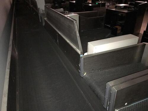 Baggage handling belts for ... check-in desks. Four belt system