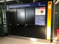 Border control information screen with three NEC 46 inch screens W3000mm H2400mm