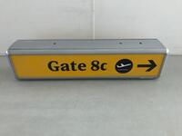 Illuminated sign, curved metal construction. H 300mm W 1250mm D 130mm