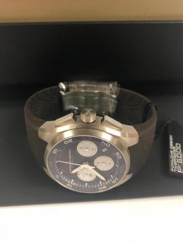 PORSCHE DESIGN P6620 M11 WATCH, 100M WATER RESISTANT, DARK BROWN RUBBER STRAP, S/N 256-038Condition: NewBox: With BoxPapers: Manual Included