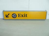 Illuminated ceiling mounted sign, rounded metal box construction, H240mm, W1100mm D60mm.
