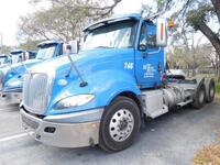 2015 INTERNATIONAL MODEL PROSTAR+ 122 6X4 NON-SLEEPER CONVENTIONAL, CUMMINS ISX15 ENGINE, 450 H.P., ENGINE BRAKE, EATON FULLER 8 SPEED TRANSMISSION WITH LOW LOW, 46,000 LB. REAR ENDS, FULL SCREW, AIR RIDE SUSPENSION WITH DUMP VALVE, DUAL 80 GALLON FUEL TA