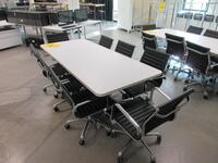 WHITE CONFERENCE TABLE WITH METAL LEGS ON CASTERS 7' X 3' X 29", (8) BLACK AND CHROME CHAIRS, (2ND FLOOR)