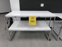 ROLLING WHITE DISPLAY TABLE WHITE CHROME FRAME ON CASTERS, 5' X 30" X 38", (1ST FLOOR)