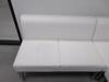 WHITE ENCORE ALLANTE WHITE ARMLESS LOVESEAT 6' x 6' x 31", W/ ALUMINUM LEGS, AND COFFEE TABLE WITH GLASS TOP, (1ST FLOOR) - 2