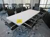 WHITE CONFERENCE TABLE WITH METAL LEGS ON CASTERS 7' X 3' X 29", (8) BLACK AND CHROME CHAIRS, (2ND FLOOR)