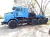 2003 OSHKOSH MODEL M1070 8X8 V8 EXTENDED CAB WINCH TRACTOR, DETROIT 8V92 ENGINE, 500 H.P., ENGINE BRAKE, ALLISON CLT 754 AUTOMATIC TRANSMISSION, PLANETARY AXLES, AIR RIDE SUSPENSION, DUAL STEEL FUEL TANKS, PTO, (2) WINCHES, 16.00R20 TIRES, STEEL WHEELS, 2