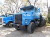 2003 OSHKOSH MODEL M1070 8X8 V8 EXTENDED CAB WINCH TRACTOR, DETROIT 8V92 ENGINE, 500 H.P., ENGINE BRAKE, ALLISON CLT 754 AUTOMATIC TRANSMISSION, PLANETARY AXLES, AIR RIDE SUSPENSION, DUAL STEEL FUEL TANKS, PTO, (2) WINCHES, 16.00R20 TIRES, STEEL WHEELS, 2 - 2