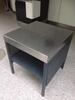 Stainless steel topped "security search table", grey perforated steel sides and legs, incorporating a single under shelf. Adjustable height on legs. W