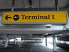 Terminal 1 direction sign, illuminated. Curved metal edge construction including internal light fittings. - 2