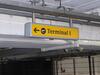 Terminal 1 direction sign, illuminated. Curved metal edge construction including internal light fittings. - 8