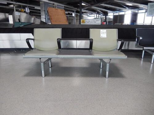 International departures Two person lounge seat and table