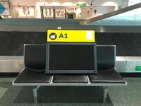 Check-in desk 'A1' sign and monitor
