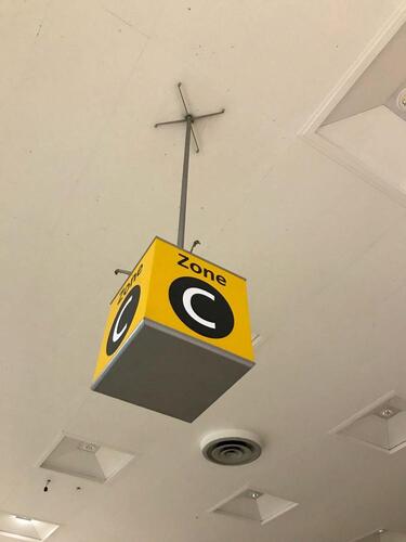 Iconic Heathrow 'Zone C' ceiling sign