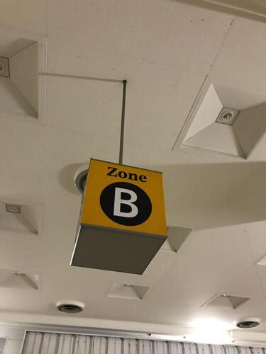 Iconic Heathrow 'Zone B' ceiling sign