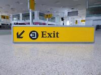 Arrivals Exit illuminated sign