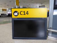 Airport Check-in desk sign and monitor 'C14?